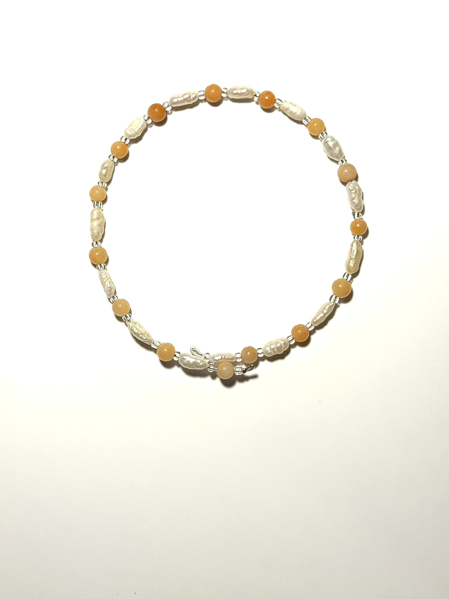 4mm smooth round opal beads rotating between clear glass spacer beads and 4mm freshwater pearls.